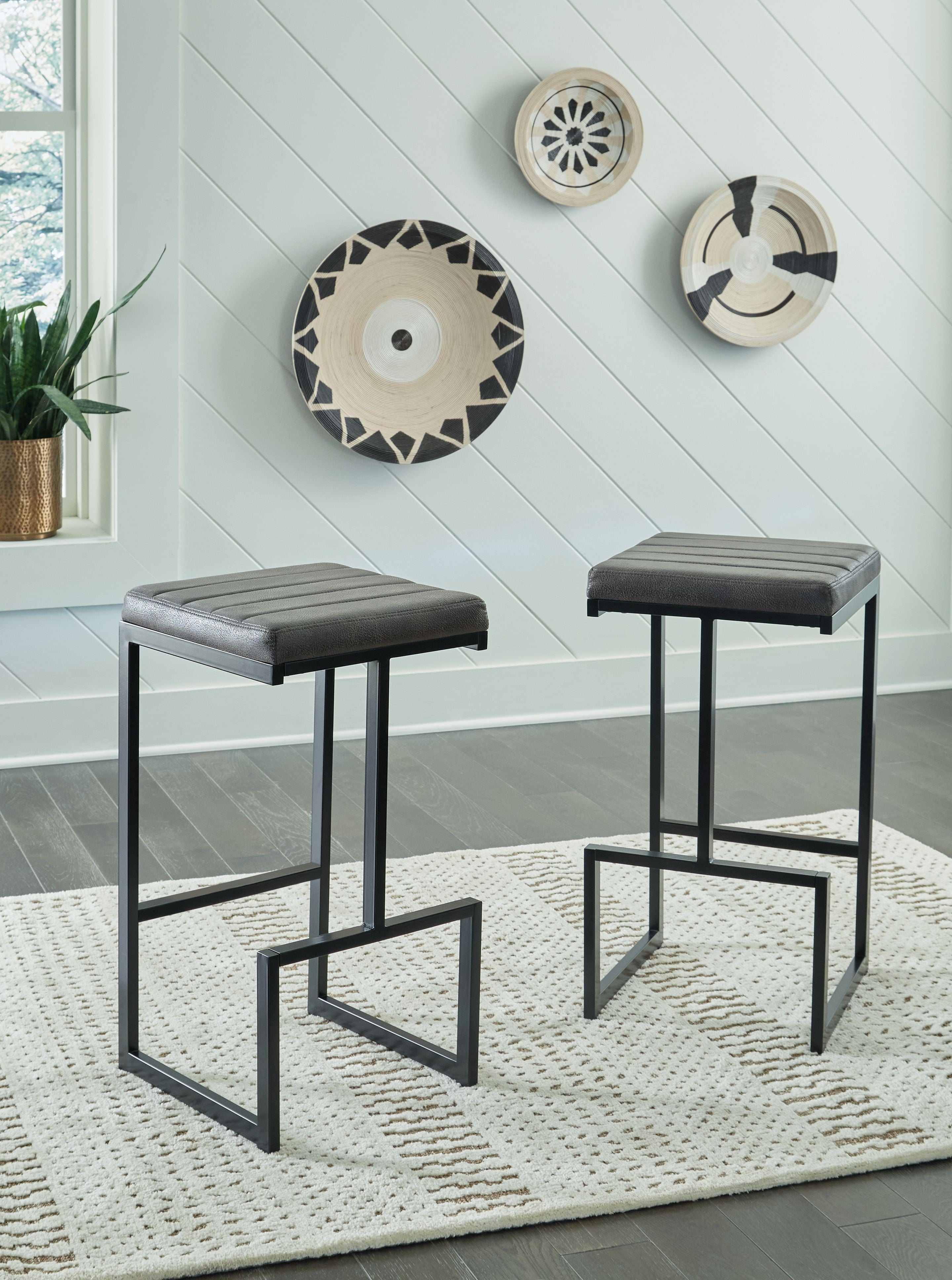 Strumford - Gray / Black - Tall Uph Barstool (Set of 2) - Premium Stool Sets from Signature Design by Ashley® - Just $265.65! Shop now at brett interiors