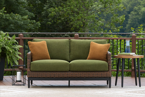 Horizon Hall - Brown / Green - Loveseat With Cushion - Premium Loveseats from Signature Design by Ashley® - Just $1306.25! Shop now at brett interiors