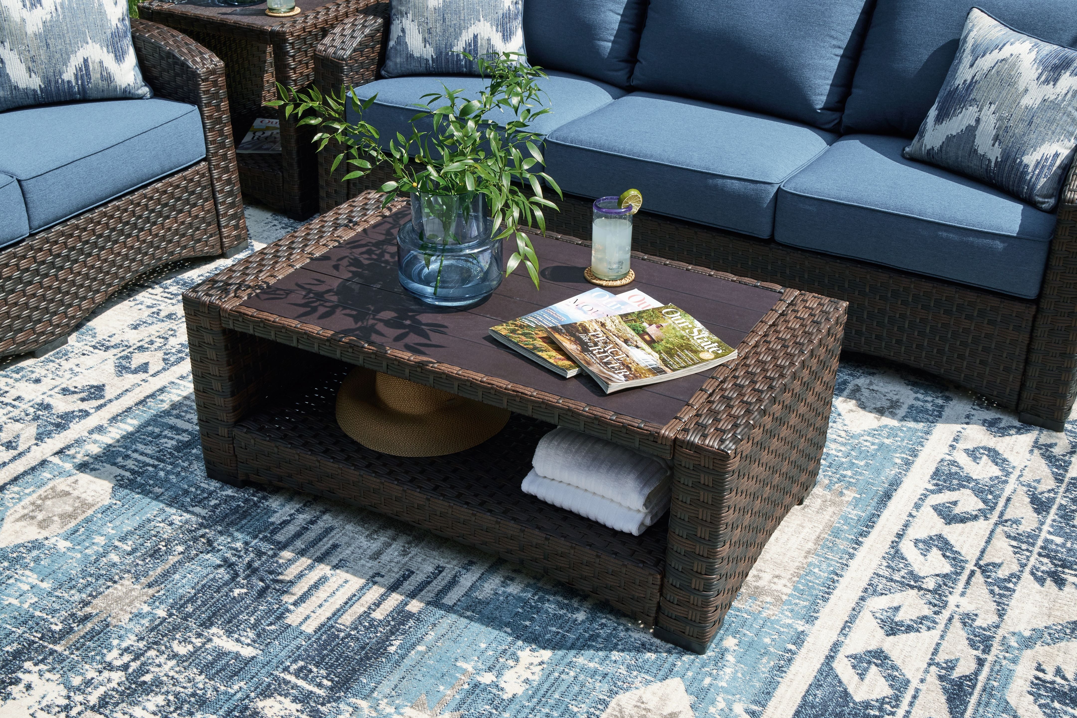 Windglow - Brown - Rectangular Cocktail Table - Premium Coffee Tables from Signature Design by Ashley® - Just $397.50! Shop now at brett interiors