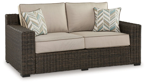 Coastline Bay - Brown - Loveseat W/Cushion - Premium Loveseats from Signature Design by Ashley® - Just $1371.25! Shop now at brett interiors