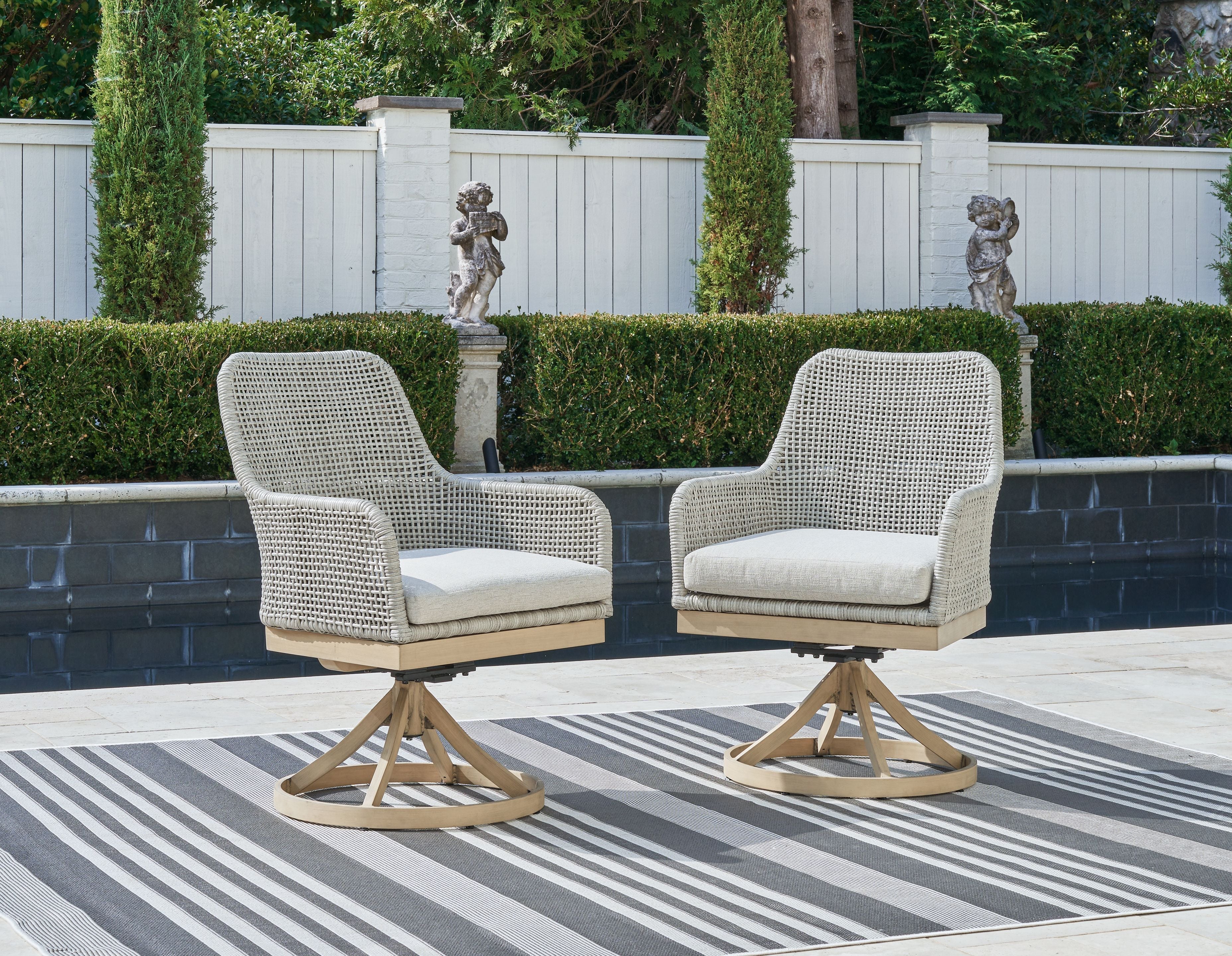 Seton Creek - Gray - Swivel Chair With Cushion (Set of 2) - Premium Chair Sets from Signature Design by Ashley® - Just $1042.40! Shop now at brett interiors