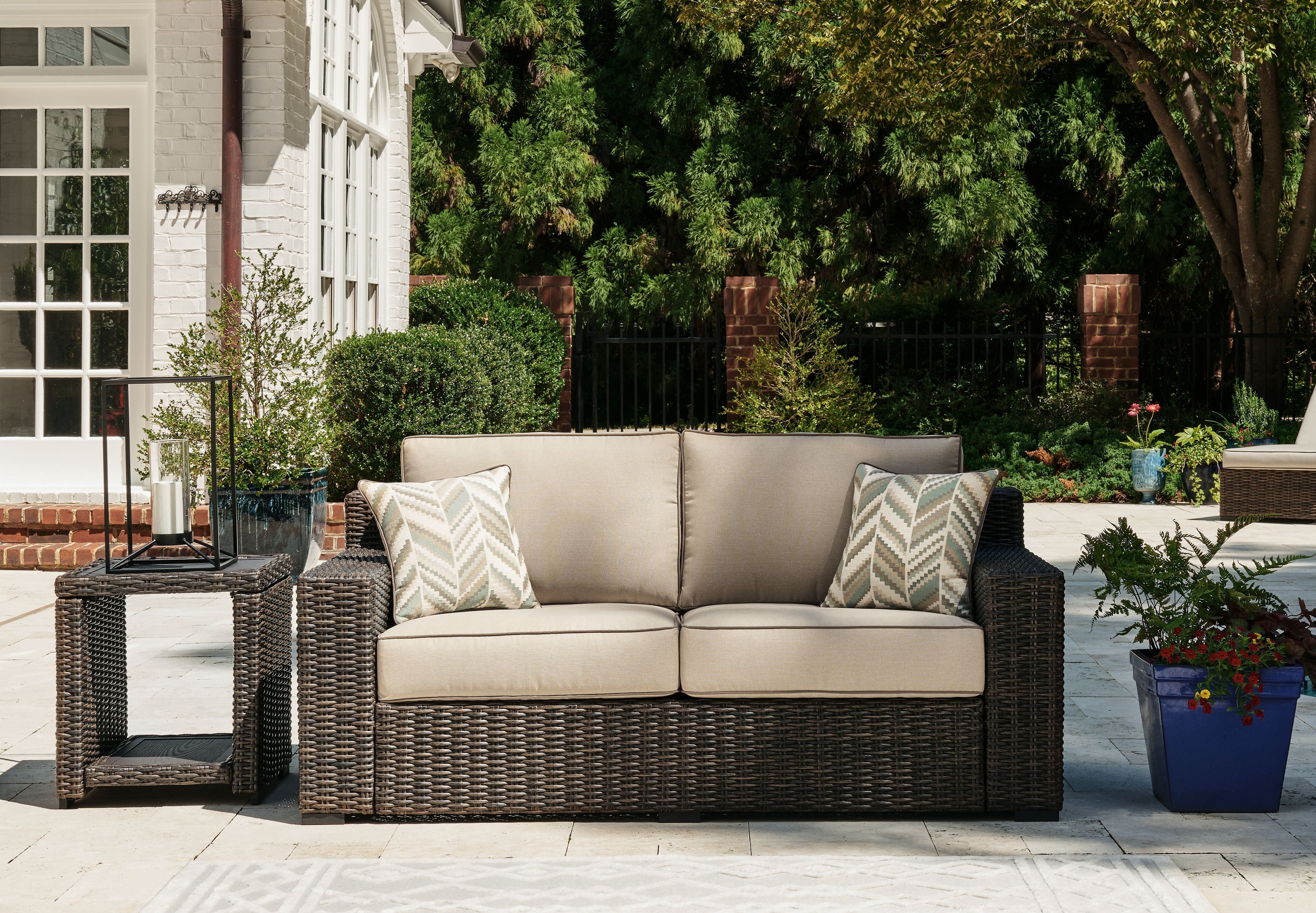 Coastline Bay - Brown - Loveseat W/Cushion - Premium Loveseats from Signature Design by Ashley® - Just $1371.25! Shop now at brett interiors