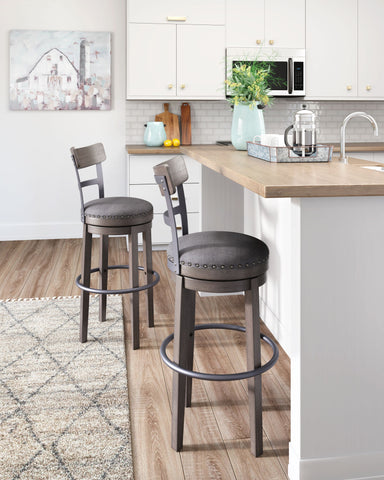 Caitbrook - Gray - Tall Uph Swivel Barstool - Premium Bar Height (28"-30") from Signature Design by Ashley® - Just $236.78! Shop now at brett interiors