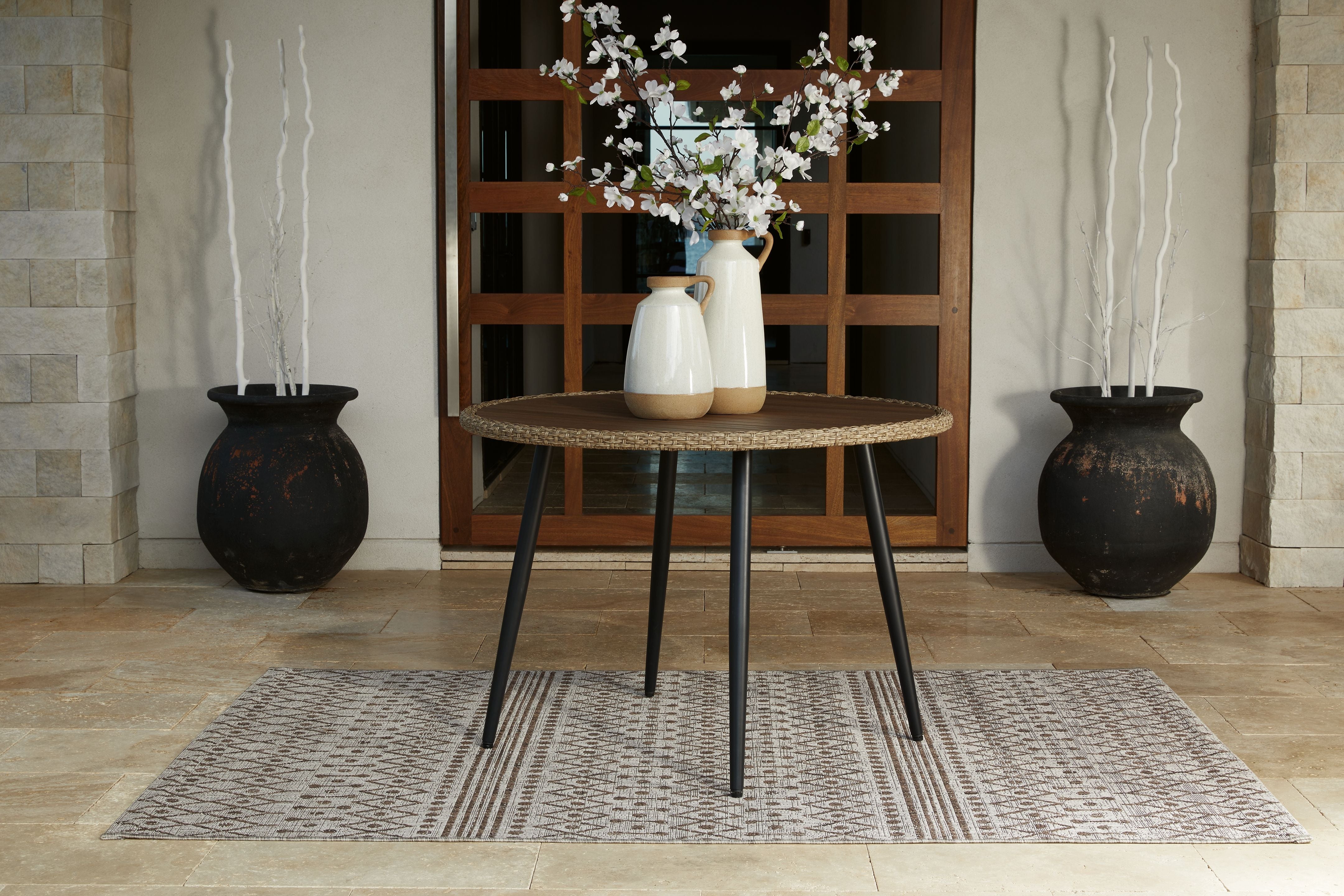 Amaris - Brown / Black - Round Dining Table - Premium Dining Tables from Ashley Furniture - Just $386.93! Shop now at brett interiors