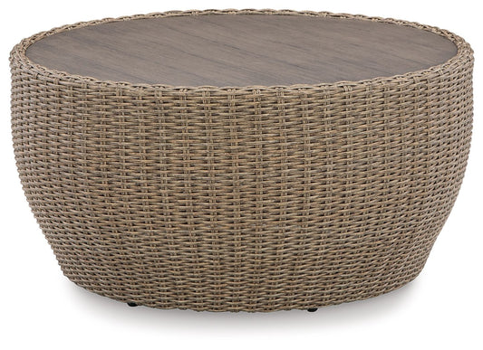 Danson - Beige - Round Cocktail Table - Premium Coffee Tables from Signature Design by Ashley® - Just $590! Shop now at brett interiors