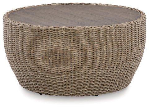 Danson - Beige - Round Cocktail Table - Premium Coffee Tables from Signature Design by Ashley® - Just $590! Shop now at brett interiors