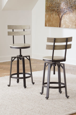 Karisslyn - Whitewash / Black - Swivel Barstool (Set of 2) - Premium Stool Sets from Signature Design by Ashley® - Just $317.65! Shop now at brett interiors