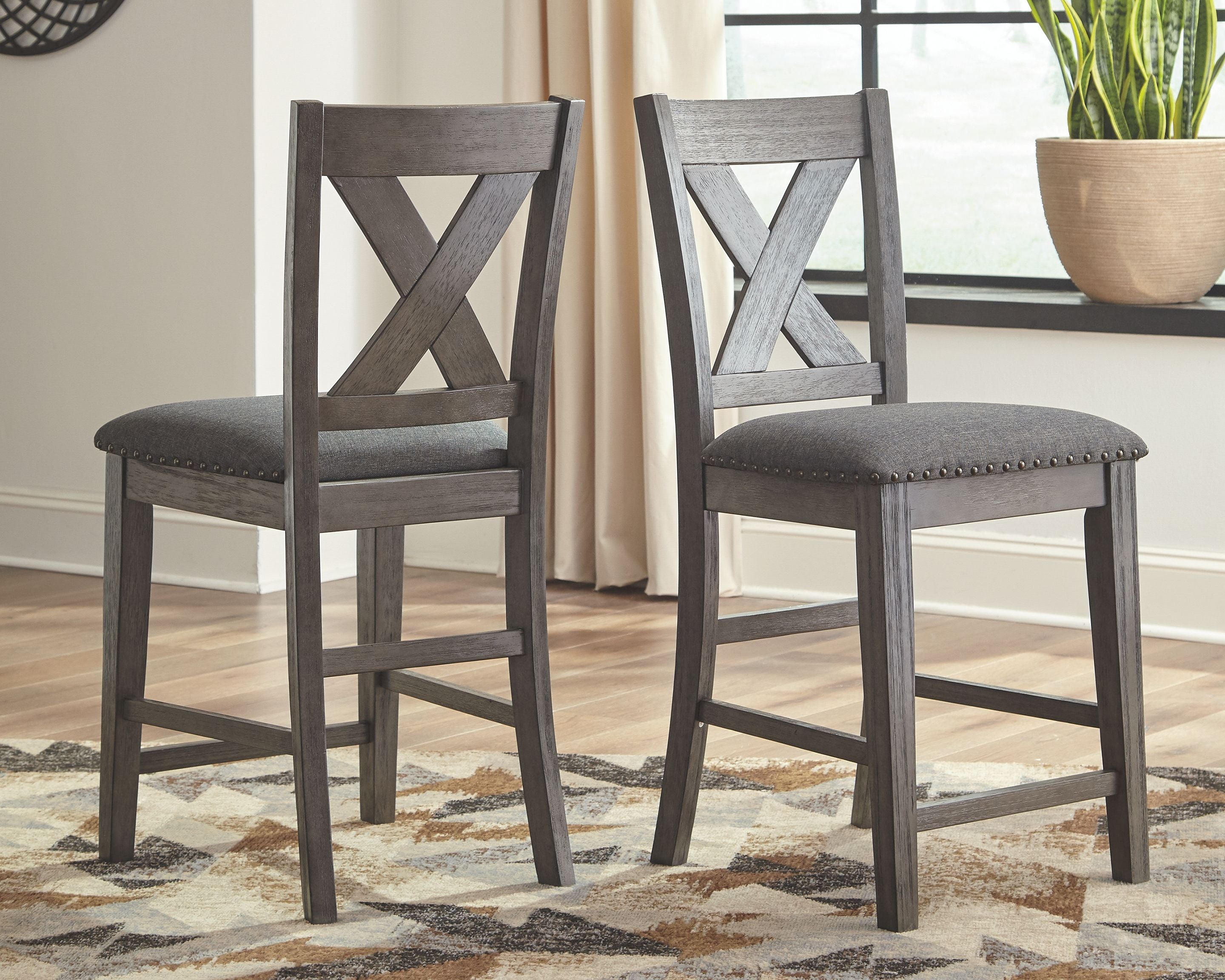 Caitbrook - Gray - Upholstered Barstool (Set of 2) - Premium Stool Sets from Signature Design by Ashley® - Just $265.65! Shop now at brett interiors