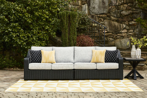 Beachcroft - Black / Light Gray - 2-Piece Outdoor Loveseat With Cushion - Premium Loveseats from Signature Design by Ashley® - Just $2202.50! Shop now at brett interiors