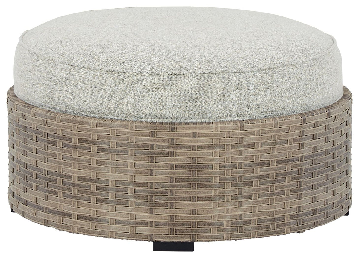 Calworth - Beige - Ottoman With Cushion - Premium Ottomans from Ashley Furniture - Just $351.88! Shop now at brett interiors