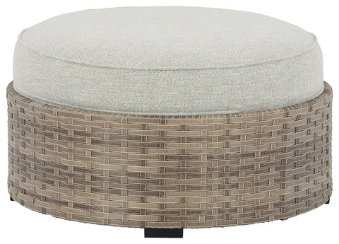 Calworth - Beige - Ottoman With Cushion - Premium Ottomans from Ashley Furniture - Just $351.88! Shop now at brett interiors