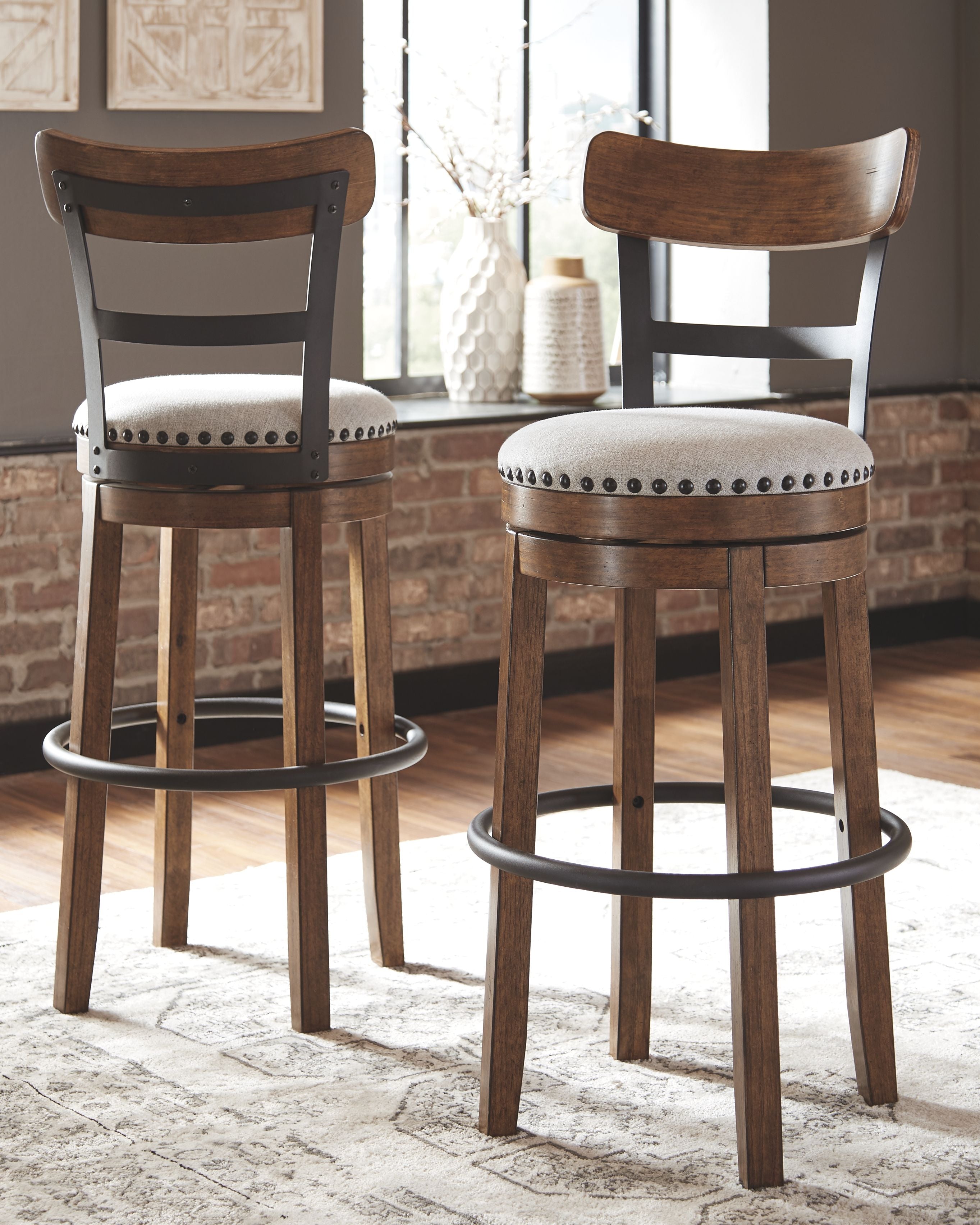 Valebeck -  Tall Upholstered Swivel Barstool - Premium Bar Height (28"-30") from Signature Design by Ashley® - Just $254.10! Shop now at brett interiors