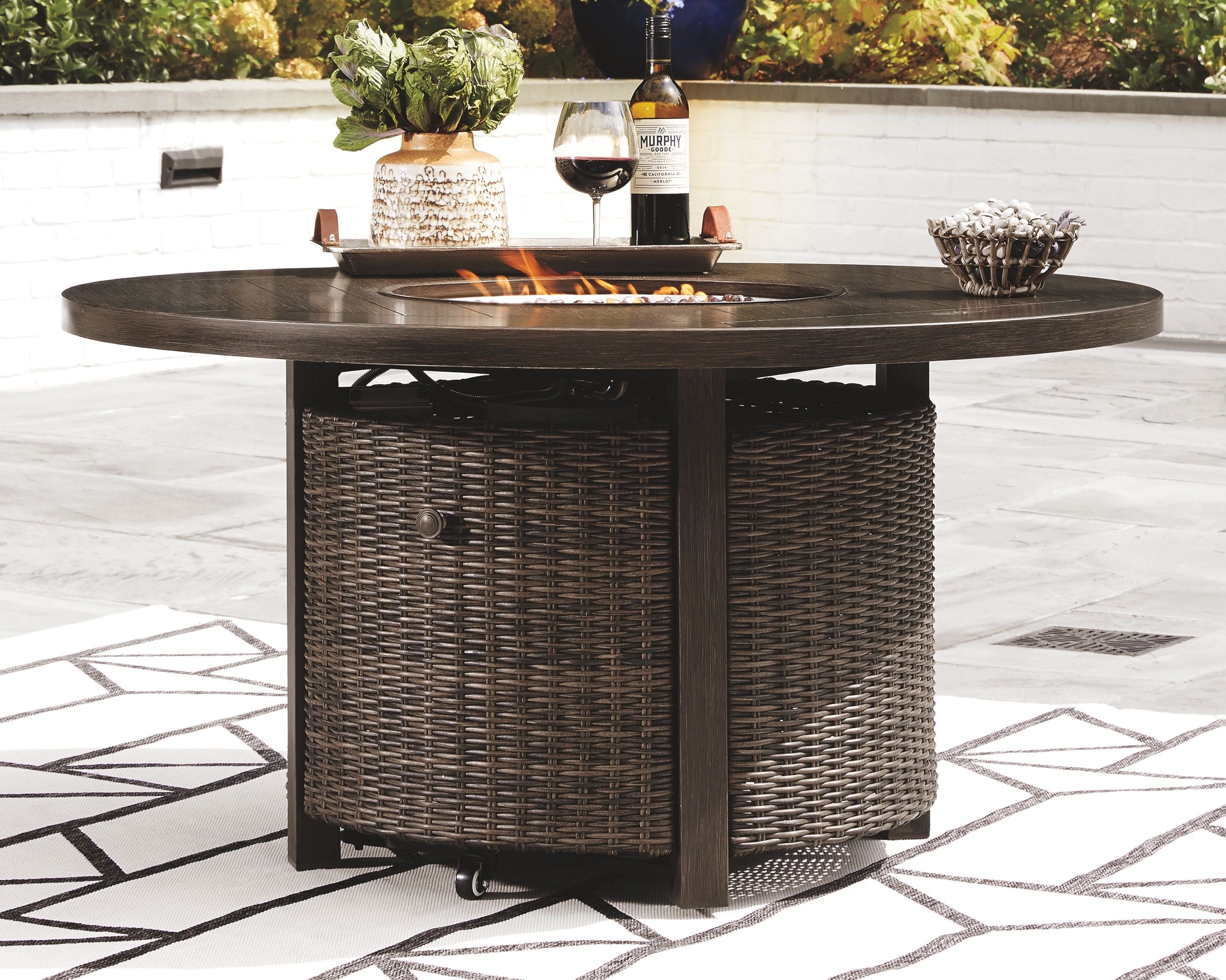 Paradise - Medium Brown - Round Fire Pit Table - Premium Fire Pits from Ashley Furniture - Just $1775.50! Shop now at brett interiors