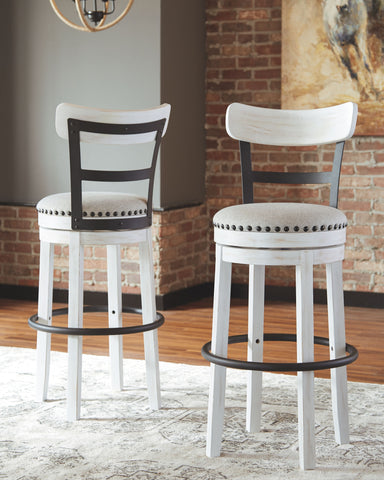 Valebeck -  Tall Upholstered Swivel Barstool - Premium Bar Height (28"-30") from Signature Design by Ashley® - Just $254.10! Shop now at brett interiors