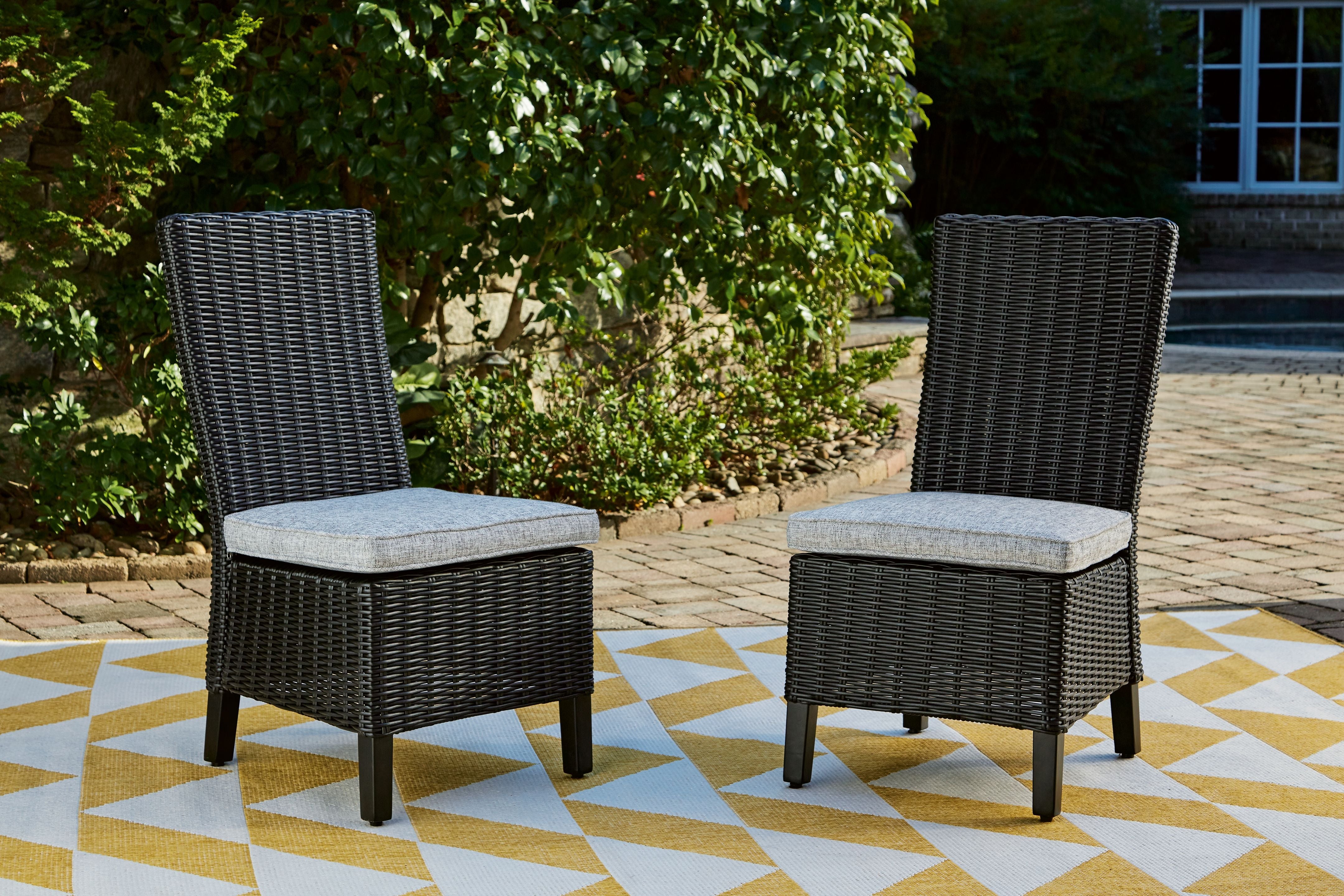 Beachcroft - Outdoor Dining Side Chair - Premium Chair Sets from Ashley Furniture - Just $881.25! Shop now at brett interiors