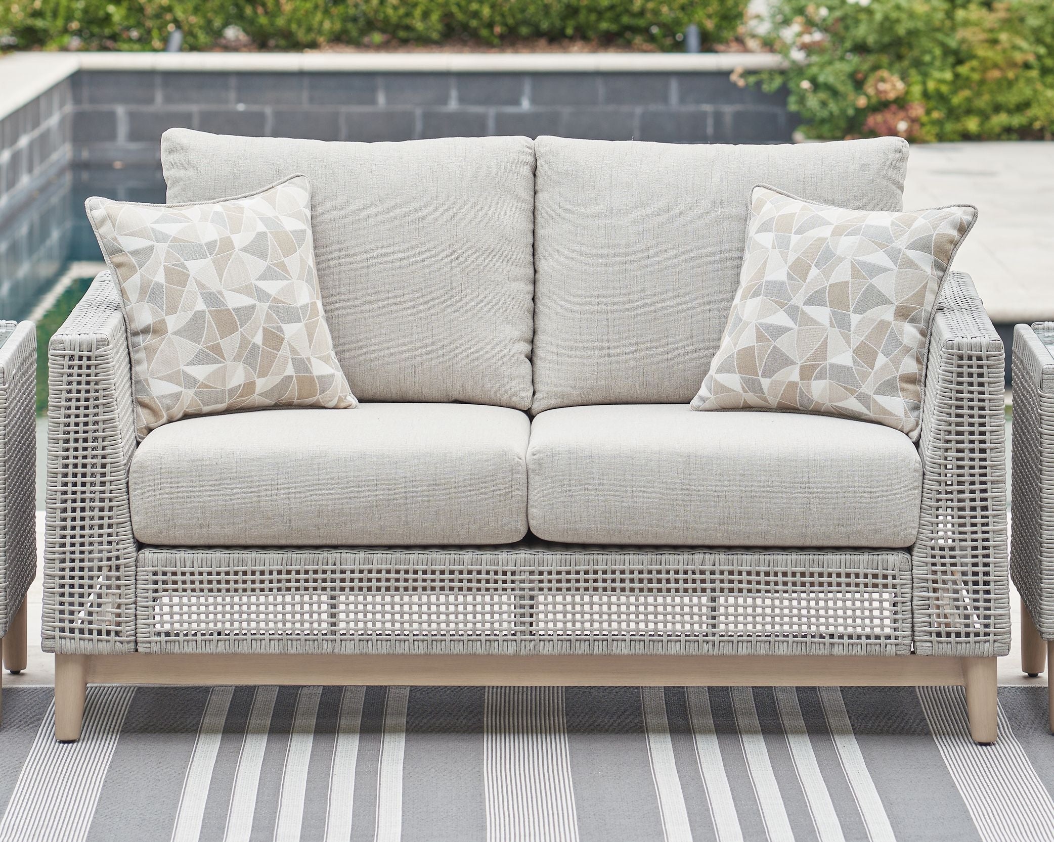 Seton Creek - Gray - Loveseat With Cushion - Premium Loveseats from Signature Design by Ashley® - Just $1436.25! Shop now at brett interiors